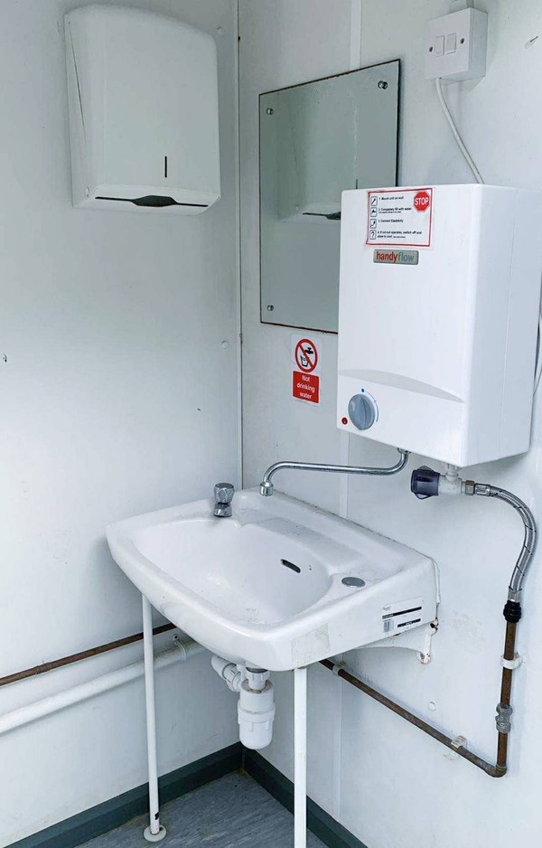 Building site toilet with Sink with hot water
