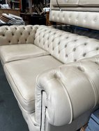 Grey button back sofa