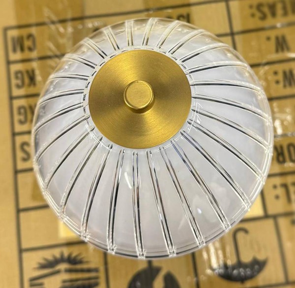Glass shade on table light