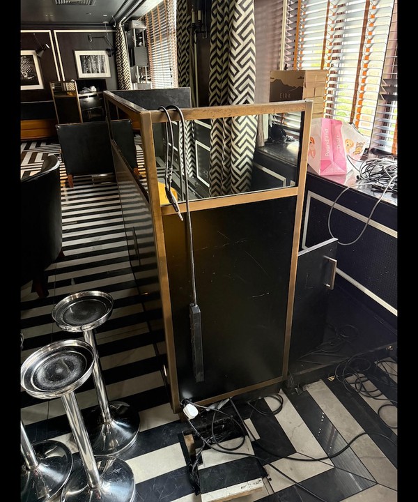 Mirrored, black and gold bar