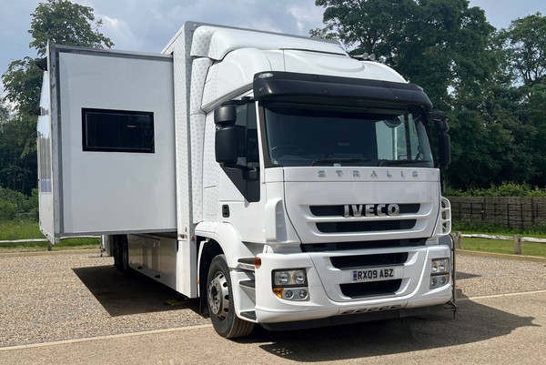 Truck with slide out pods