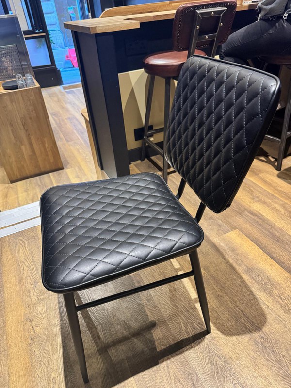 Black leather cafe chairs