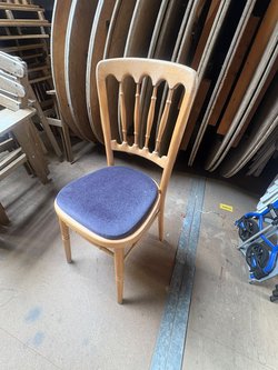 Natural Cheltenham Chairs with Blue Seat Pads.